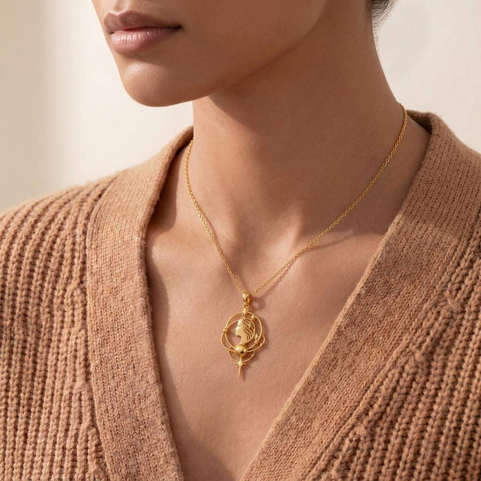Gold Plated Silver Venus Aura Necklace worn with a ribbed cardigan and open neckline