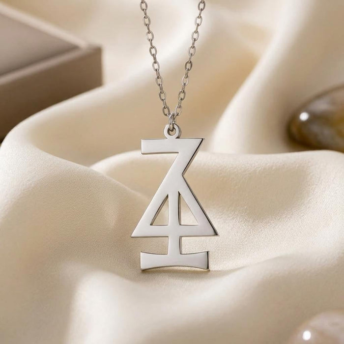 Front view of the Hansa Asteroid pendant on ivory satin