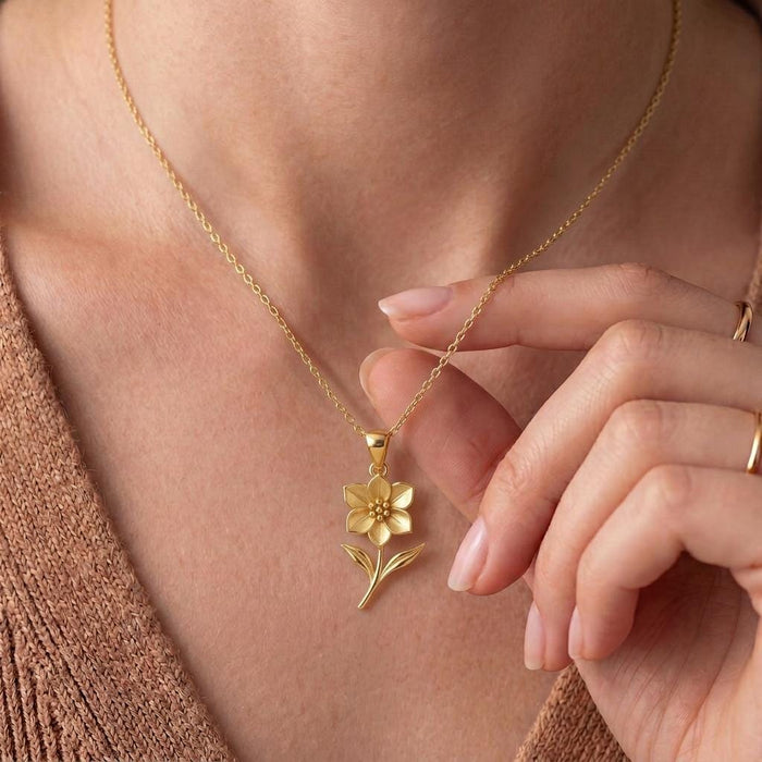 Close view of Gold Plated Silver Hellebore Flower Necklace at the collarbone