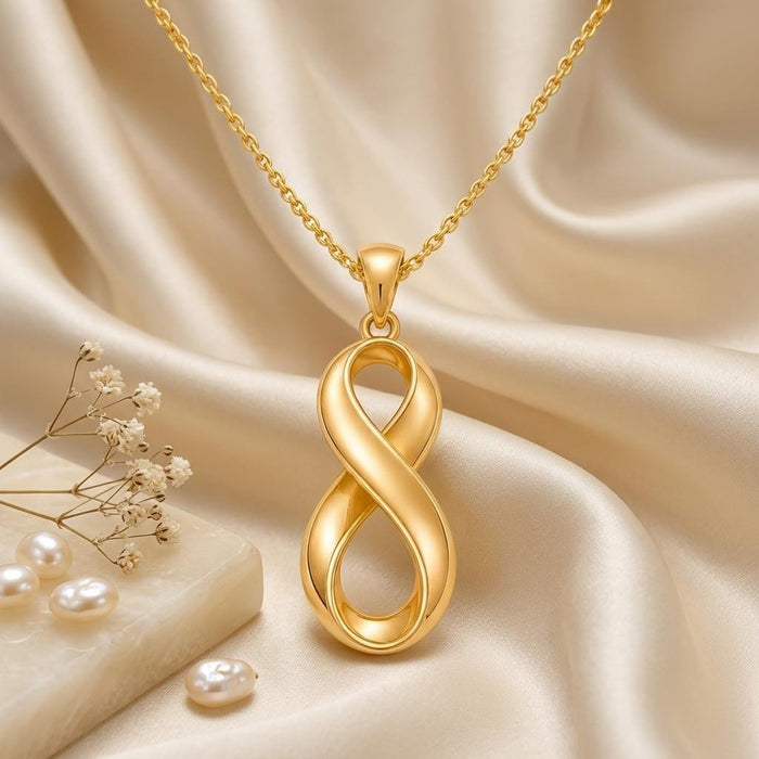 Gold Plated Silver Infinity Fold pendant with pearls and small white flowers