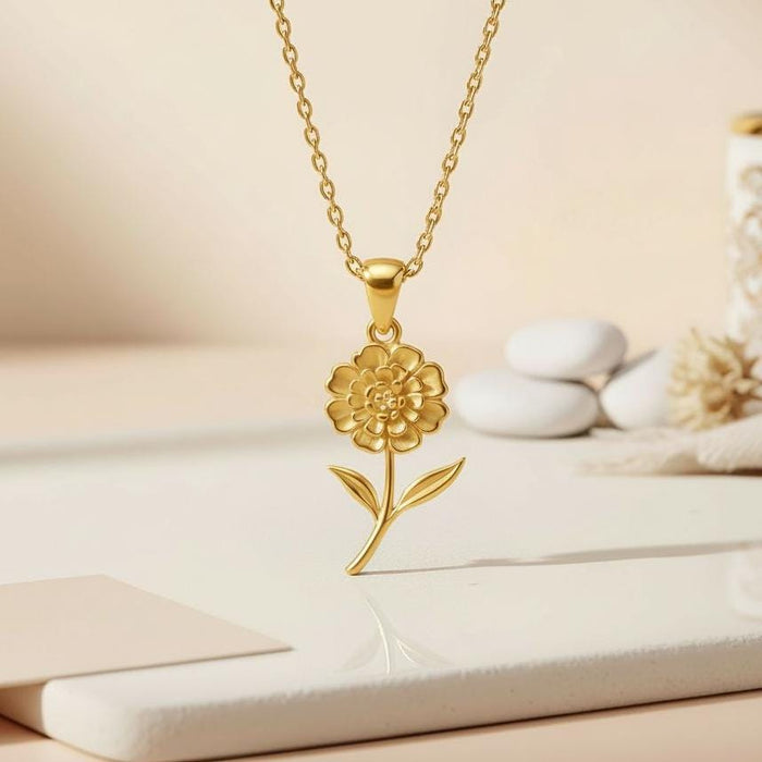 Close-up of a Gold Plated Silver Lantana Flower Necklace with layered petals, curved stem, and two leaves