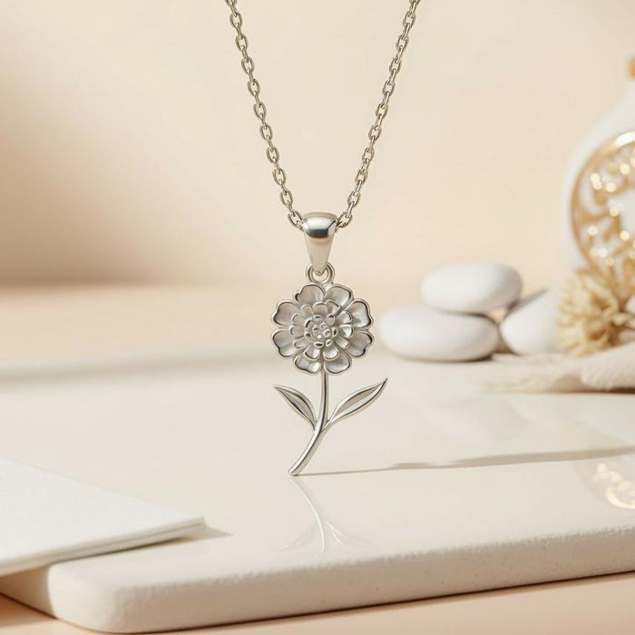 Close-up of a Silver Lantana Flower Necklace with layered petals and two leaves