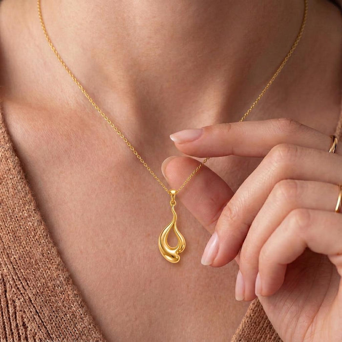 Close-up of the Gold Plated Silver Liquid Flow Pendant Necklace worn at the neckline