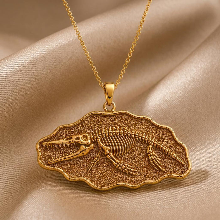 Gold Plated Silver close-up of the Livyatan Fossil Pendant Necklace on beige satin