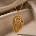 Gold Plated Silver Lunar Peacock Relic pendant necklace with an openwork peacock-feather design on champagne satin