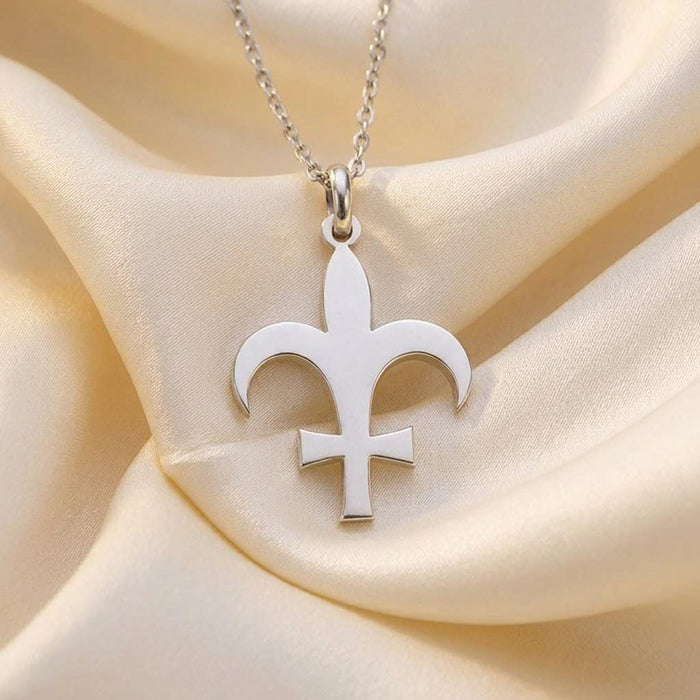 Front close-up of the polished Silver Lutetia symbol pendant on ivory satin
