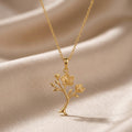 Gold-finish Magnolia Soft Bloom Pendant with branching flower and buds on champagne satin