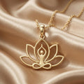 Gold Plated Silver Meditation Lotus Necklace with openwork lotus, meditating figure, and infinity detail on champagne satin