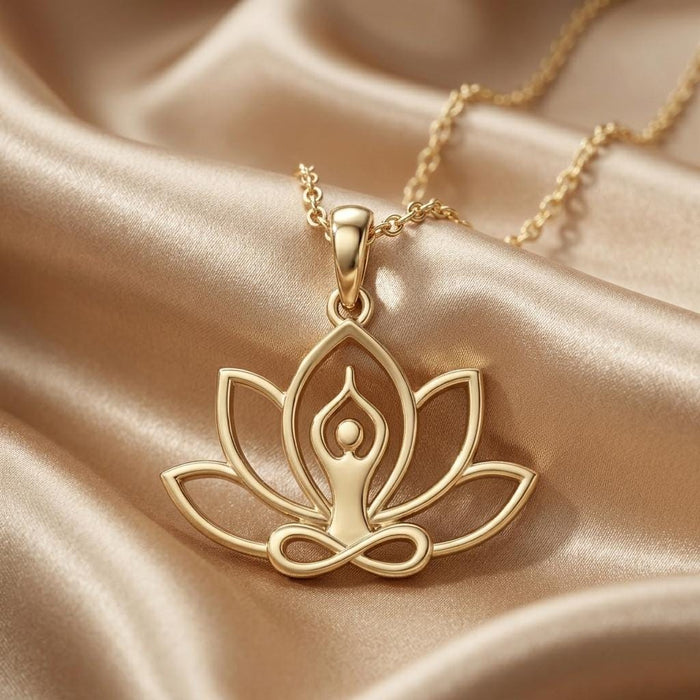 Gold Plated Silver Meditation Lotus Necklace with openwork lotus, meditating figure, and infinity detail on champagne satin