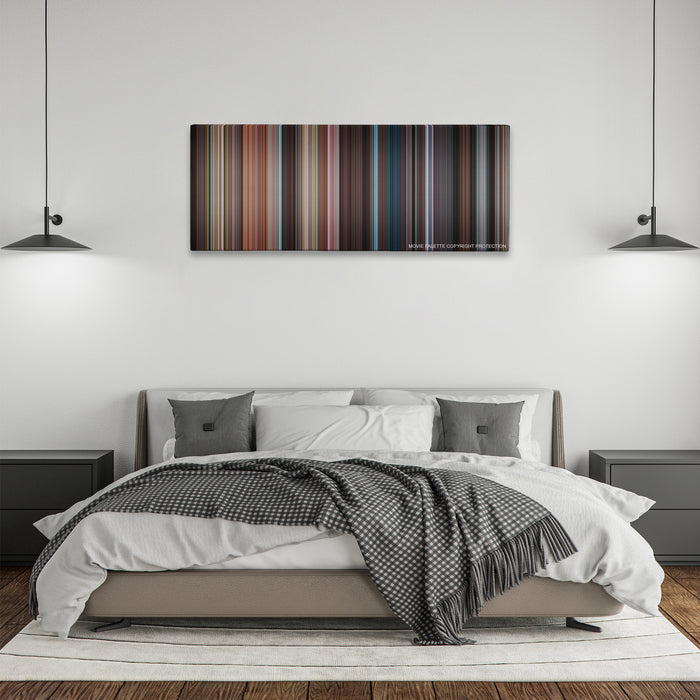 No Strings Attached color palette canvas above a bed, between two black pendant lamps