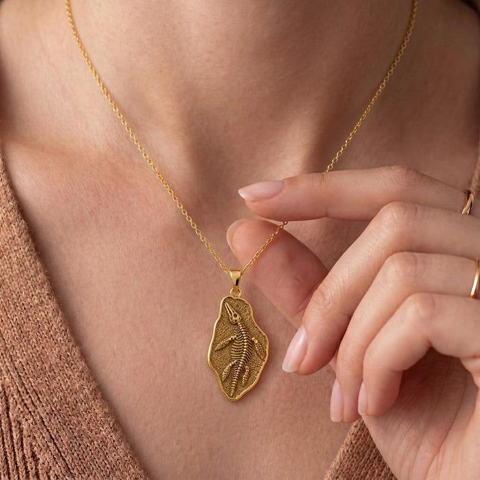 Close neckline view of a Gold Plated Silver Nothosaurus Fossil Pendant Necklace