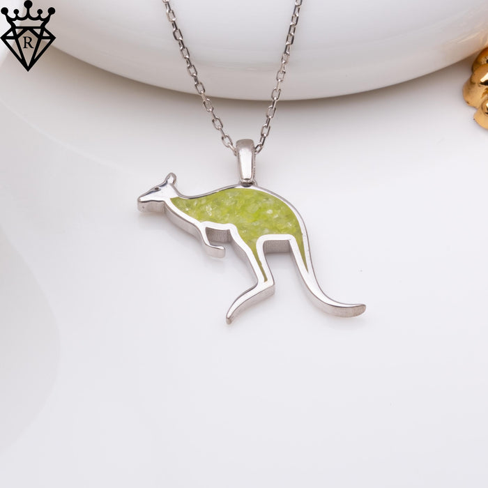 Angled product close-up of a green-inlay leaping kangaroo pendant