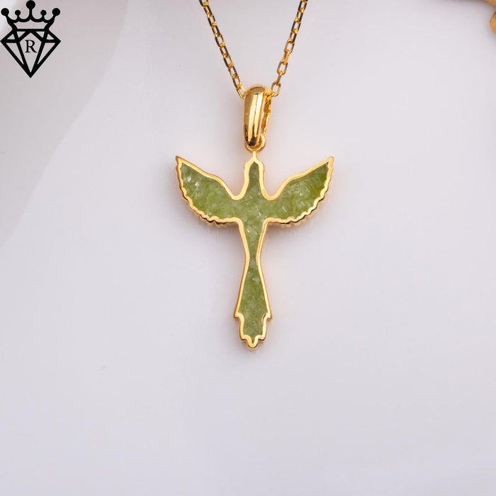 Green phoenix pendant centered on its chain against a pale backdrop
