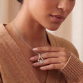 Phosphorus Symbol Necklace in 925 sterling silver worn with a tan V-neck knit