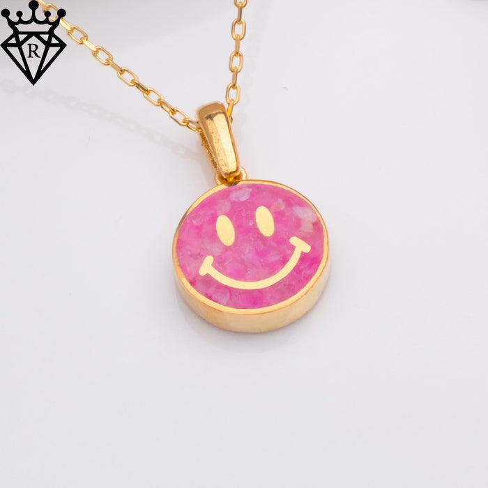 Side angle showing the pink agate setting and Gold Plated Silver pendant edge