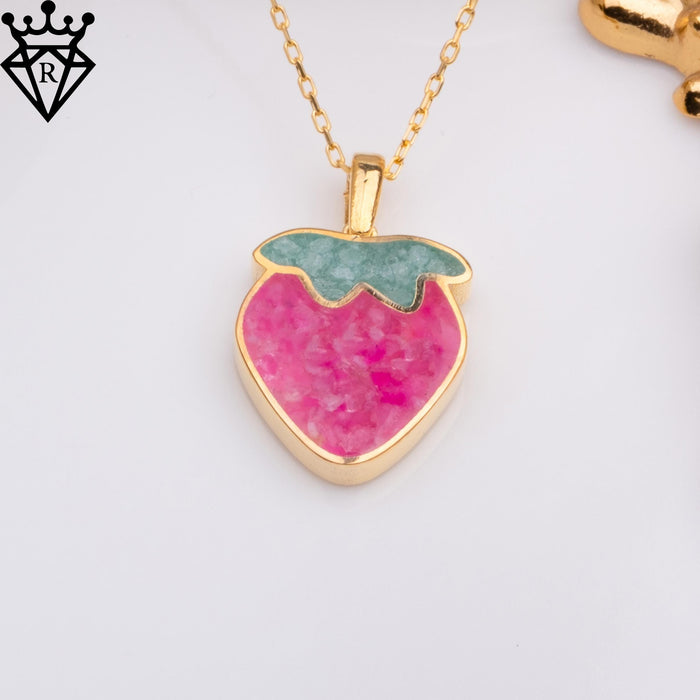 Pendant detail showing the strawberry outline and Gold Plated Silver border