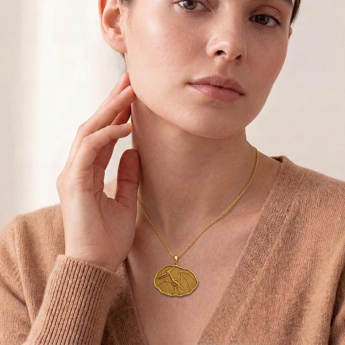 Model wearing a Gold Plated Silver Quetzalcoatlus Fossil Pendant Necklace