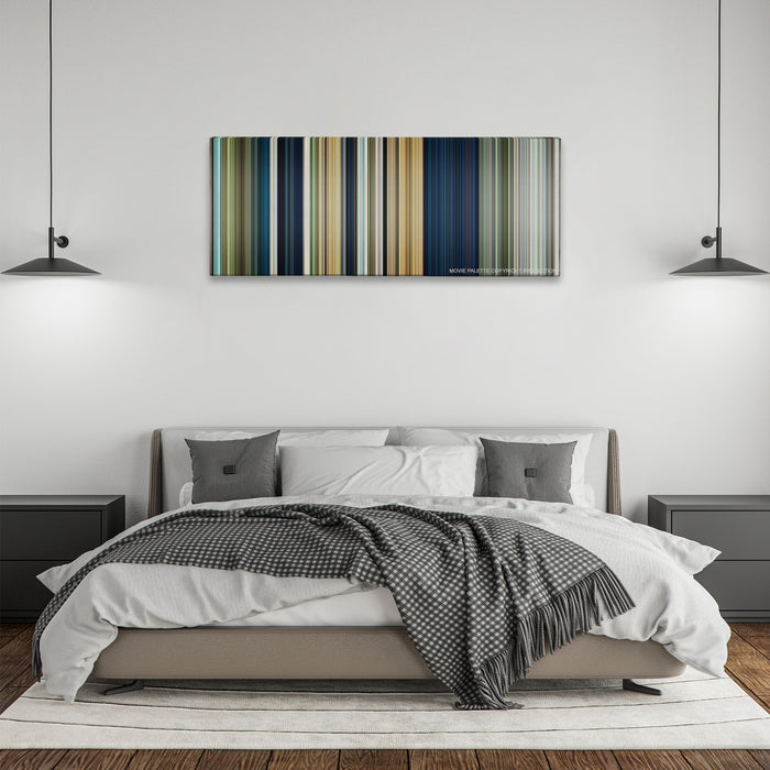 Rambo color palette canvas above a bed, between two black pendant lamps