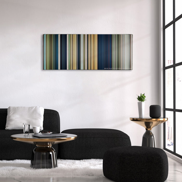 Rambo color palette canvas above a black sofa with a gold-topped table