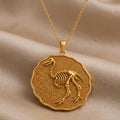 Gold Plated Silver Aepyornis Fossil Pendant Necklace with raised skeletal bird relief on a textured scalloped medallion
