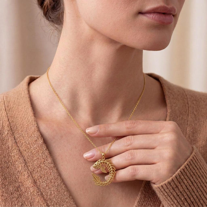 Gold Plated Silver Sacred Koi Relic pendant necklace worn at the neckline