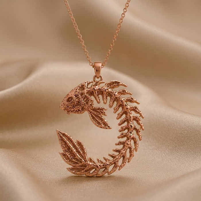 Rose Gold Plated Sacred Koi Relic pendant close-up showing the fish head, openwork body, and layered tail fins