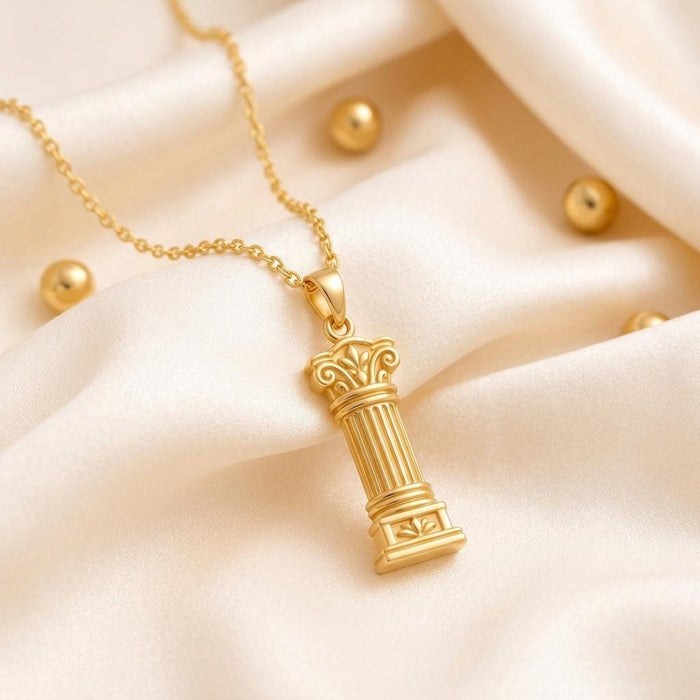 Gold Plated Silver Sacred Pillar Necklace with fluted column pendant on cream satin and decorative beads