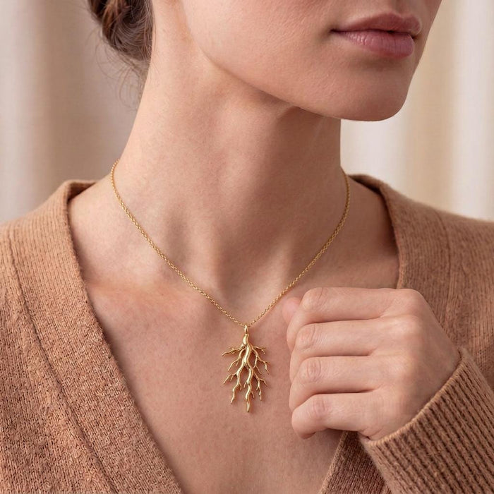 Close neckline view of Gold Plated Silver Sacred Root Necklace with branching root pendant