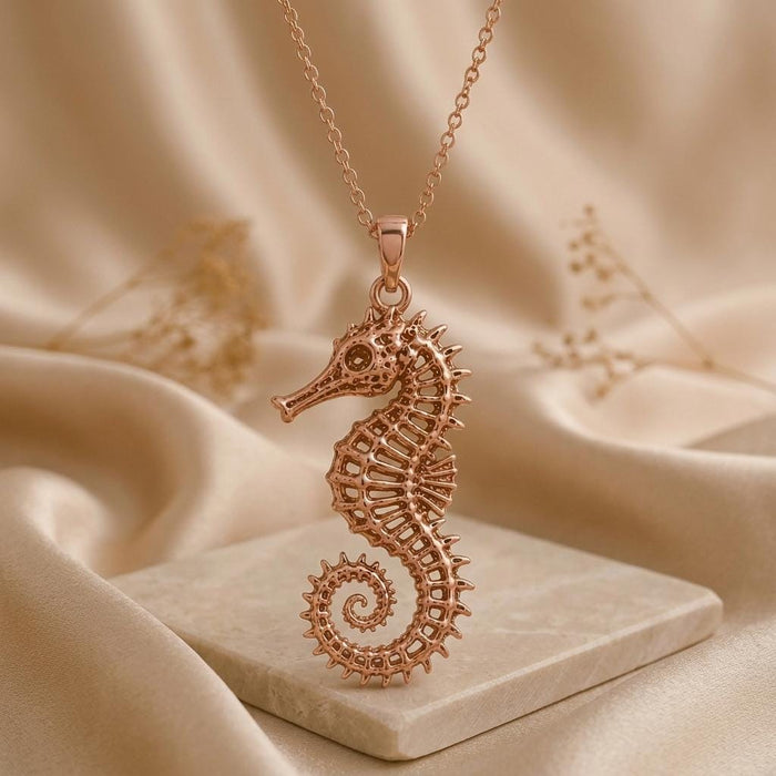 Rose Gold Plated Sacred Seahorse Pendant Necklace with ridged back detail on satin and stone