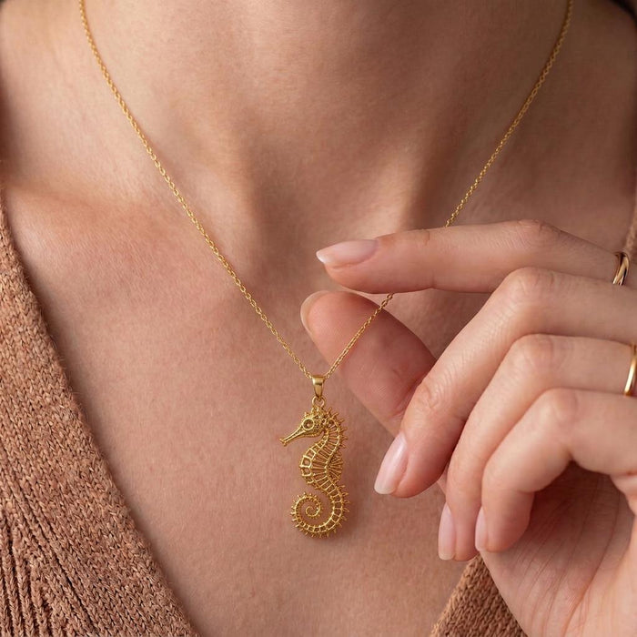 Close-up of Gold Plated Silver Sacred Seahorse Pendant Necklace worn at the collarbone