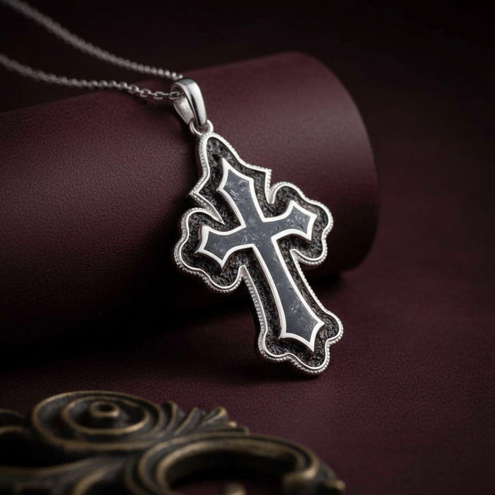 Onyx Cross Pendant Necklace with dark inlay and a raised cross on burgundy leather