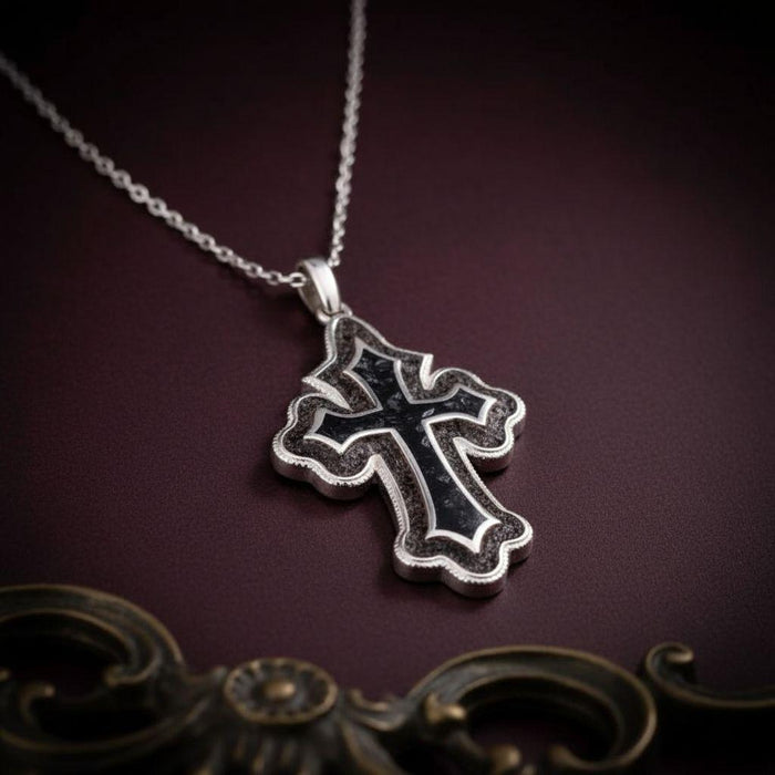 Angled view of the Onyx Cross Pendant Necklace showing its layered profile