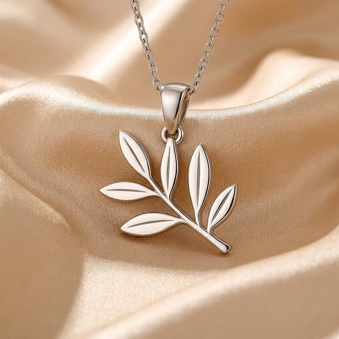 Olive branch pendant with six engraved leaves on champagne satin
