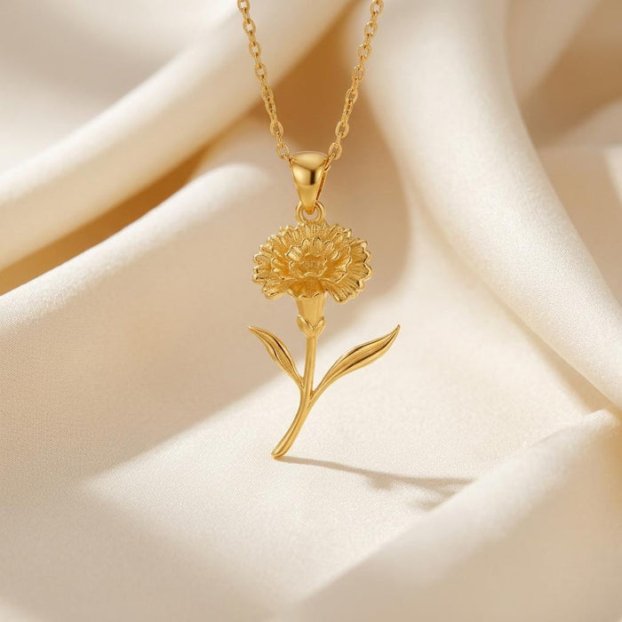 Gold Plated Silver Stock Flower Pendant Necklace with layered engraved bloom and curved two-leaf stem on cream satin