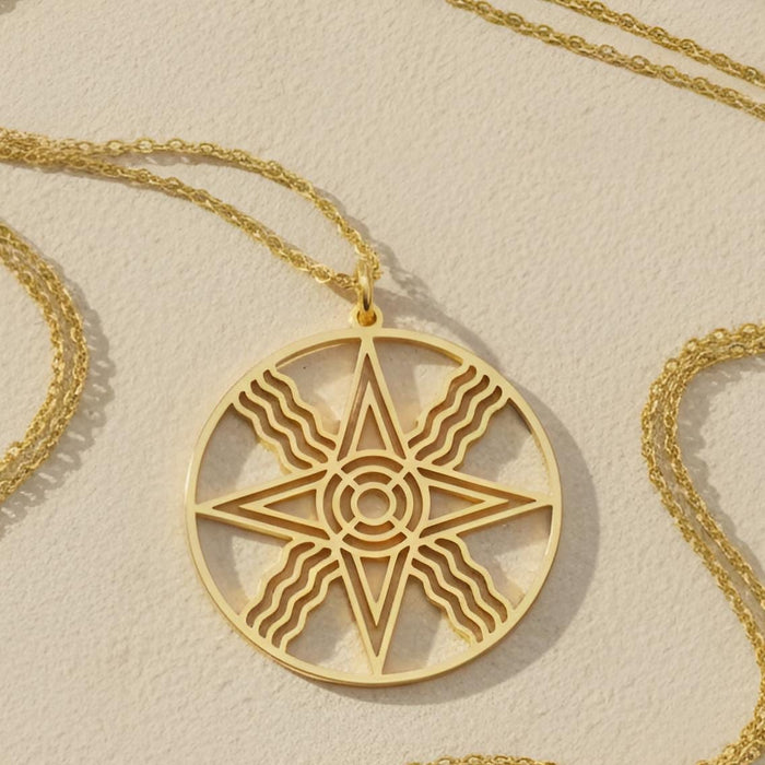 Close-up of Gold Plated Silver Sumerian sun medallion with eight-point star and wavy rays
