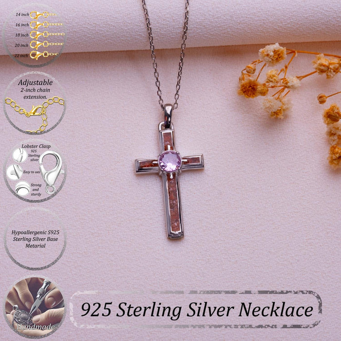 Sunstone Cross Necklace beside an outdated necklace-information graphic on pale pink fabric