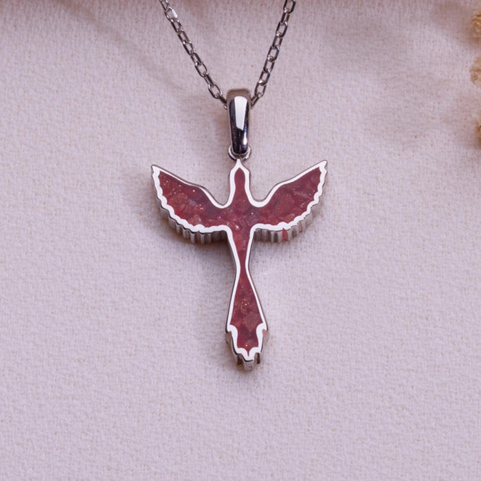 Sunstone jasper dove pendant necklace in 925 sterling silver on pale fabric