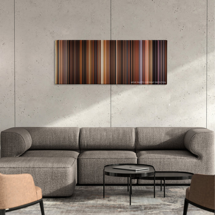 The Godfather: Part II color palette canvas on a concrete wall above a gray sectional sofa