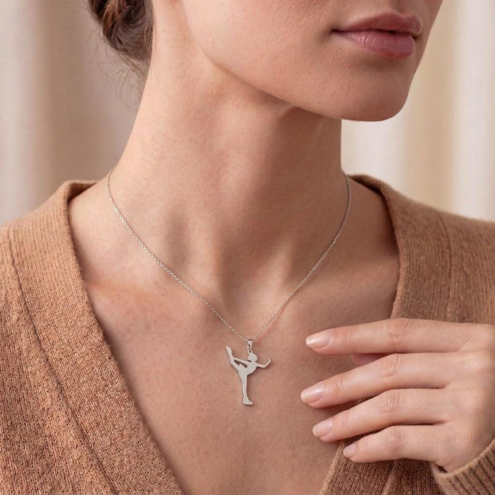 Close neckline view of a model wearing the upright extension skater pendant
