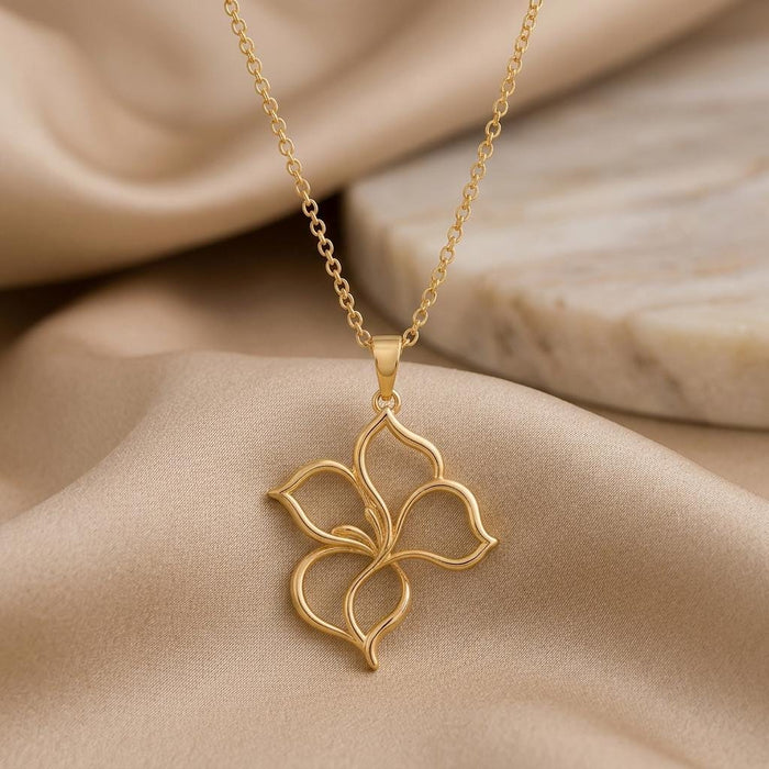 Gold Plated Silver Velvet Petal Pendant Necklace with four openwork petals on champagne satin