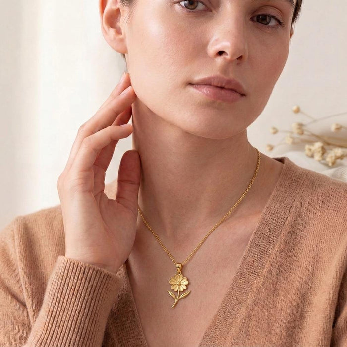 Model wearing a Gold Plated Silver Verbena Flower Pendant Necklace centered below the collarbone