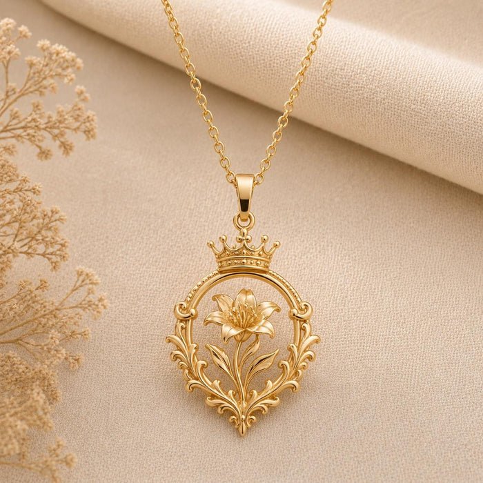 Gold Plated Silver Victorian Crown Bloom Necklace with crown-topped floral pendant on beige textured fabric beside dried flowers