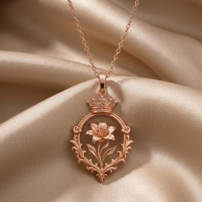 Rose Gold Plated Victorian Crown Bloom Necklace with crown-topped floral pendant on champagne satin