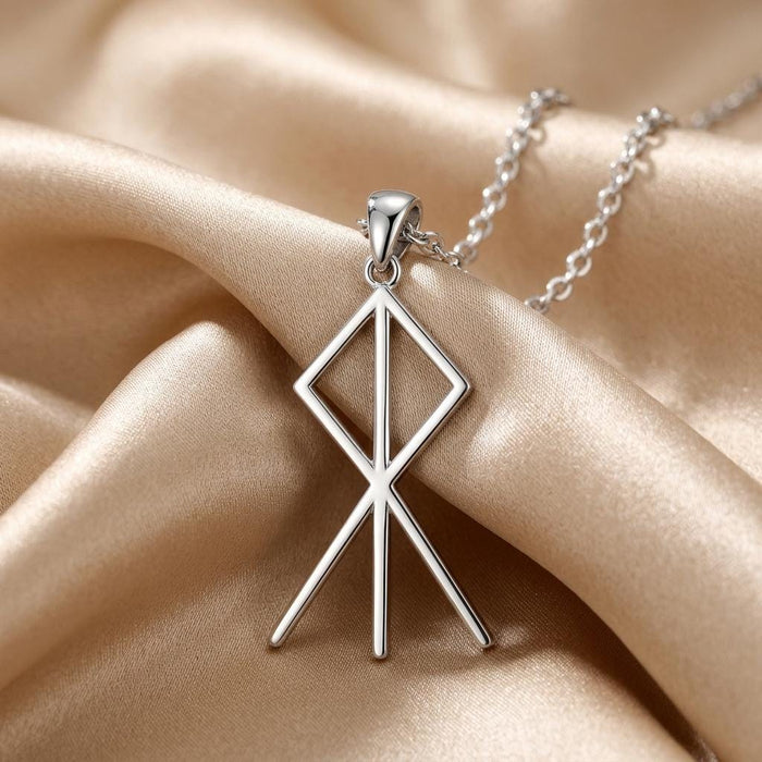 Silver Viking Courage Rune pendant with a centered vertical bar on champagne satin
