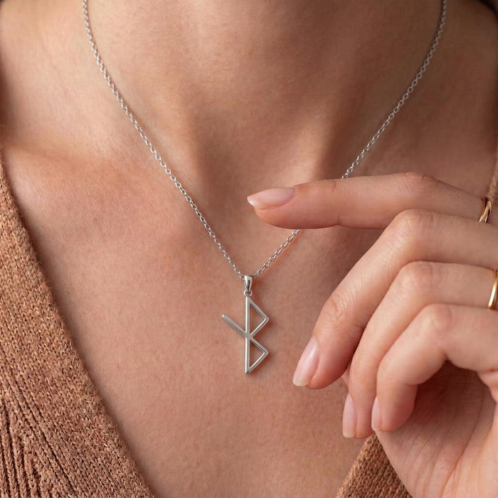 Silver Viking Healing Rune Necklace close-up worn at the neckline