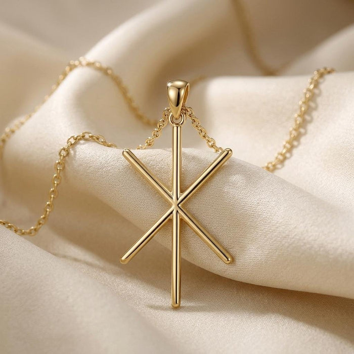 Gold Plated Silver Viking Strength Bind Rune pendant with six rays on ivory satin